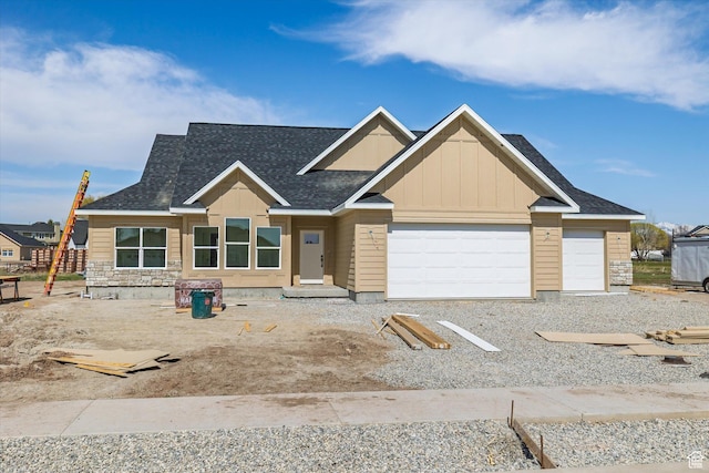 569 Eagle Dr, Preston, ID 83263 - view of front facade featuring board and batten siding, a garage, and a shingled roof