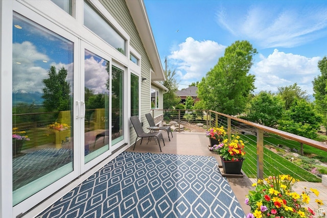 balcony featuring french doors