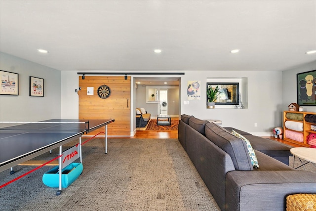 playroom featuring recessed lighting and wood finished floors