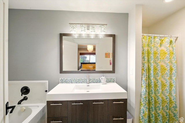 full bath with vanity, a tub to relax in, and a shower with shower curtain
