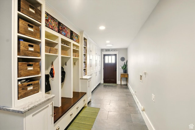 mudroom featuring baseboards, tile patterned floors, and recessed lighting
