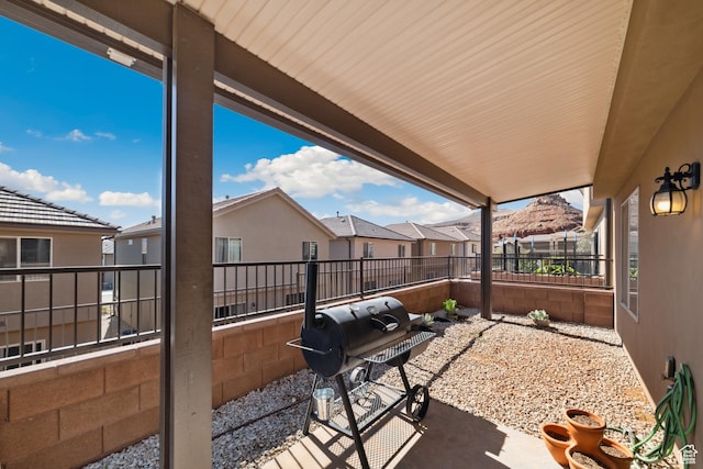 5849 S Firebird Way, St George, UT 84790 - view of patio with a residential view, a fenced backyard, and grilling area