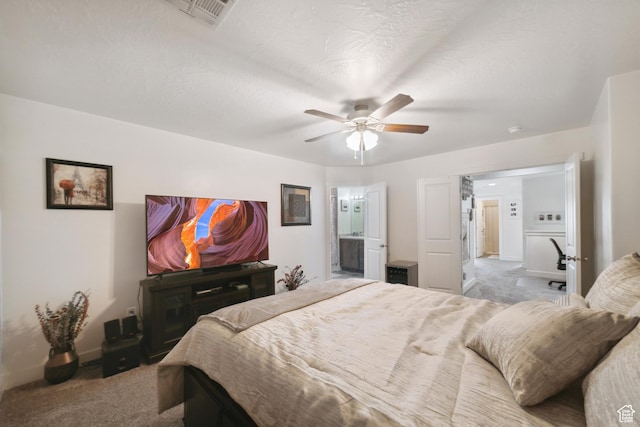 5849 S Firebird Way, St George, UT 84790 - bedroom featuring carpet floors, ensuite bath, and baseboards
