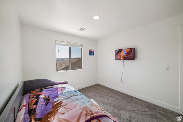 5849 S Firebird Way, St George, UT 84790 - bedroom with carpet flooring and baseboards