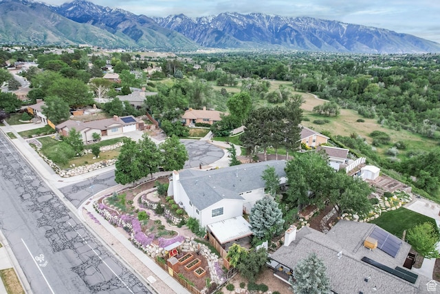 aerial view of residential area featuring a mountain backdrop