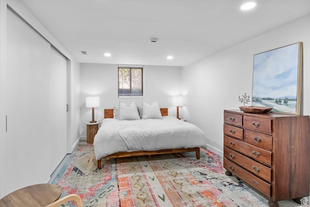 bedroom featuring recessed lighting and baseboards