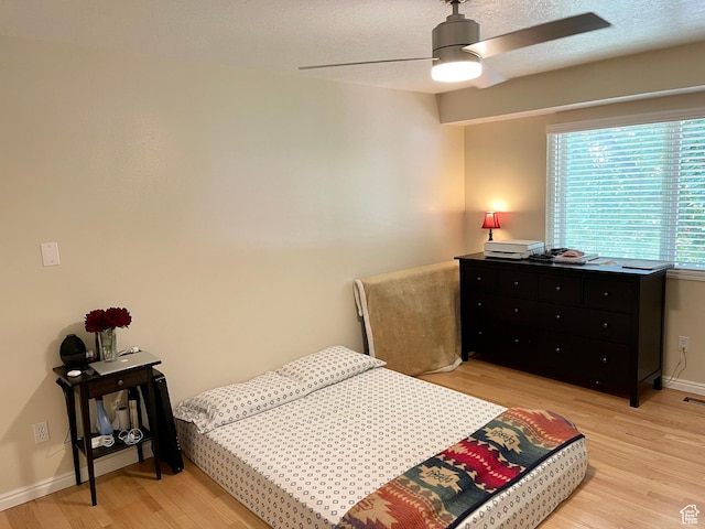 595 N 1200th St E, Lehi, UT 84043 - bedroom featuring light wood-style floors, baseboards, and ceiling fan