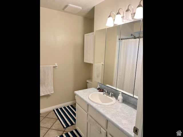 595 N 1200th St E, Lehi, UT 84043 - bathroom with vanity, tile patterned flooring, toilet, curtained shower, and baseboards