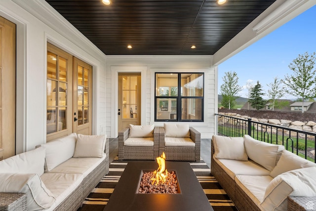 1677 Lambert Ln, Kamas, UT 84036 - balcony featuring an outdoor living space with a fire pit