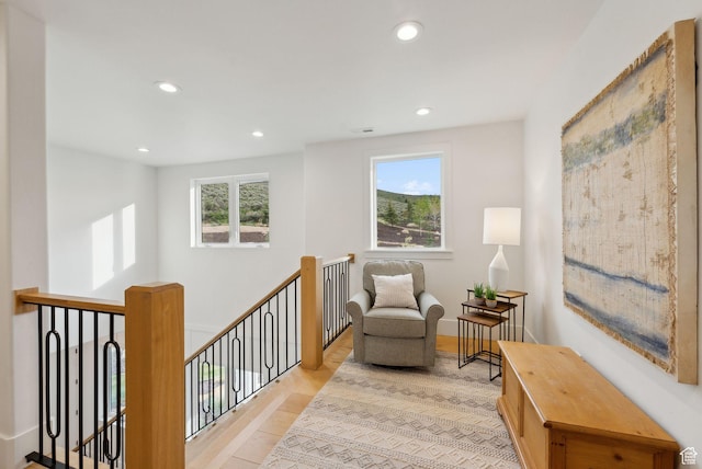1677 Lambert Ln, Kamas, UT 84036 - sitting room with plenty of natural light, an upstairs landing, recessed lighting, and light wood finished floors