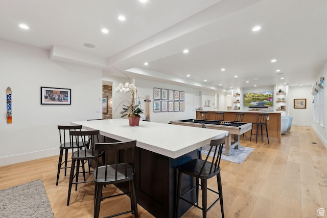 1677 Lambert Ln, Kamas, UT 84036 - kitchen with a large island, recessed lighting, light wood finished floors, baseboards, and light countertops