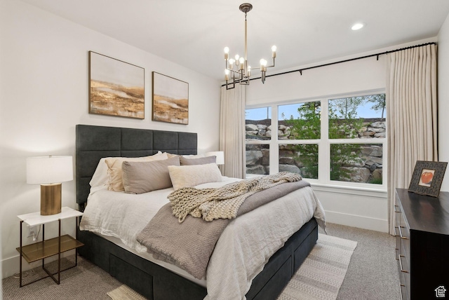 1677 Lambert Ln, Kamas, UT 84036 - bedroom featuring light colored carpet, a chandelier, and baseboards