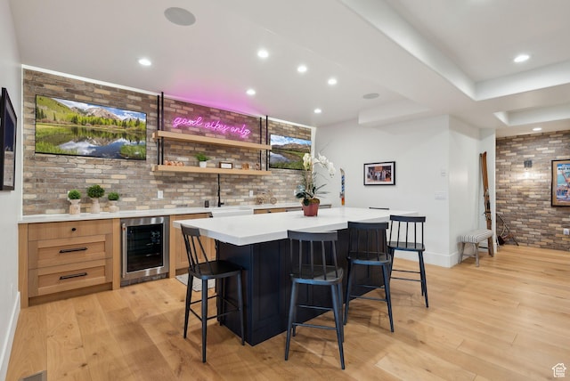 1677 Lambert Ln, Kamas, UT 84036 - indoor wet bar featuring wine cooler, brick wall, light wood-style floors, recessed lighting, and baseboards