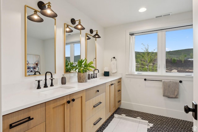 1677 Lambert Ln, Kamas, UT 84036 - bathroom featuring double vanity, tile patterned flooring, baseboards, and recessed lighting