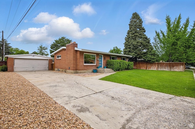 2925 N 220 E, Provo, UT 84604 - ranch-style house with an outbuilding, brick siding, a chimney, and a detached garage