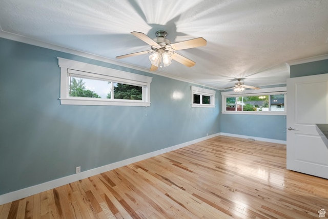 2925 N 220 E, Provo, UT 84604 - unfurnished room featuring ornamental molding, baseboards, ceiling fan, and hardwood / wood-style flooring
