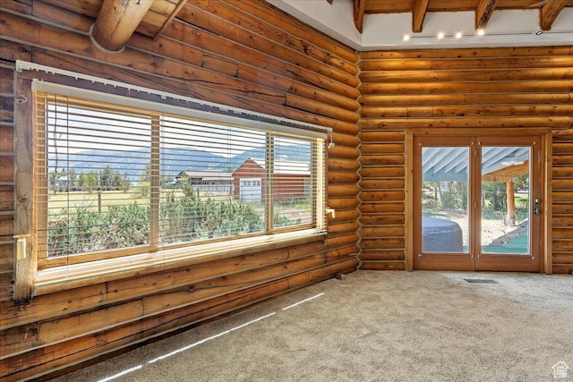 5375 N 3325 E, Eden, UT 84310 - carpeted spare room featuring log walls and beamed ceiling