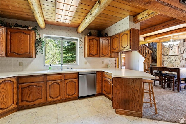 5375 N 3325 E, Eden, UT 84310 - kitchen featuring dishwasher, a sink, a peninsula, wood ceiling, and brown cabinetry