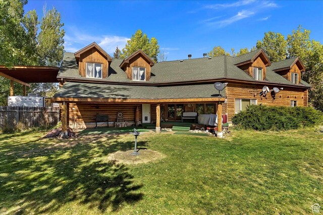 5375 N 3325 E, Eden, UT 84310 - rear view of house featuring roof with shingles, log siding, and a patio area
