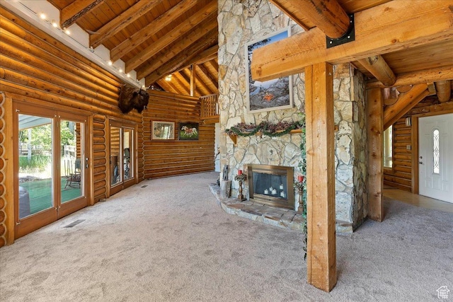 5375 N 3325 E, Eden, UT 84310 - unfurnished living room with log walls, wooden ceiling, beam ceiling, carpet, and high vaulted ceiling