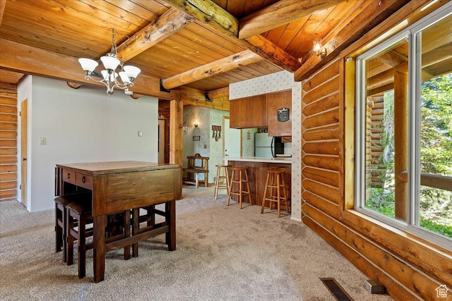 5375 N 3325 E, Eden, UT 84310 - dining space featuring wood ceiling, rustic walls, carpet flooring, a chandelier, and beam ceiling