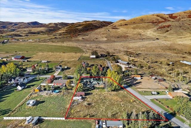 5375 N 3325 E, Eden, UT 84310 - aerial view of property and surrounding area with property parcel outlined and a mountain backdrop