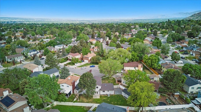 aerial overview of property's location with nearby suburban area