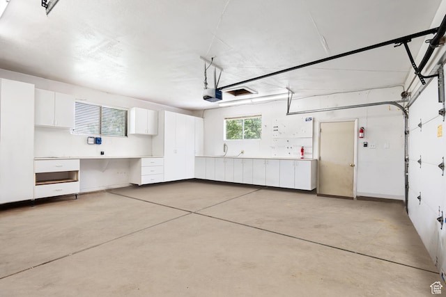 4115 Edgehill Dr, Ogden, UT 84403 - garage featuring a garage door opener
