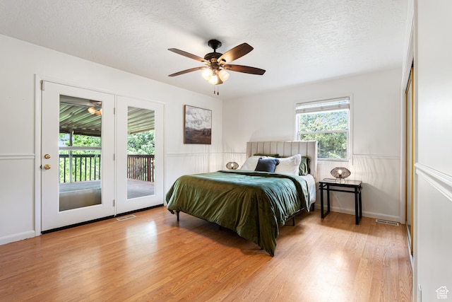4115 Edgehill Dr, Ogden, UT 84403 - bedroom with access to outside, light wood-type flooring, a textured ceiling, and ceiling fan