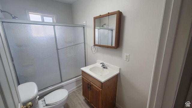 1260 N 800 W, Provo, UT 84604 - bathroom with vanity, toilet, bath / shower combo with glass door, and wood finished floors