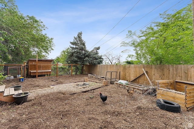 32 S Kingdon Ln E, North Salt Lake, UT 84054 - view of yard with fence and exterior structure