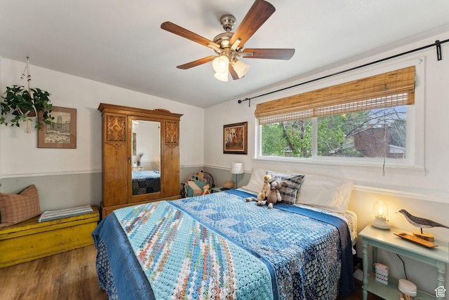 32 S Kingdon Ln E, North Salt Lake, UT 84054 - bedroom featuring wood finished floors, lofted ceiling, and ceiling fan