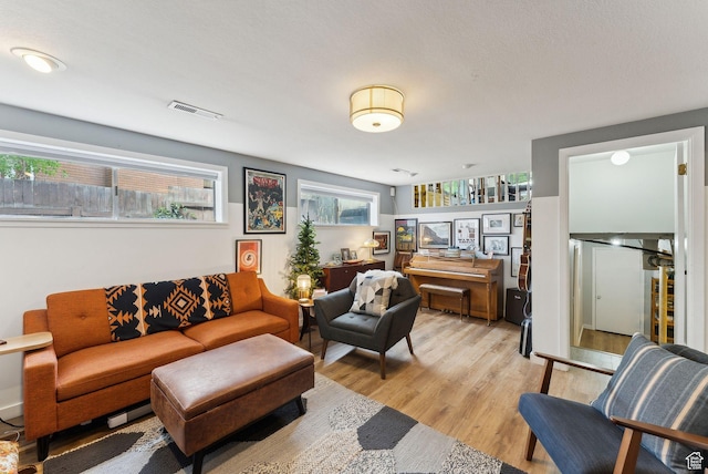 32 S Kingdon Ln E, North Salt Lake, UT 84054 - living room featuring light wood finished floors