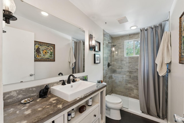 32 S Kingdon Ln E, North Salt Lake, UT 84054 - bathroom with a shower stall, toilet, and vanity