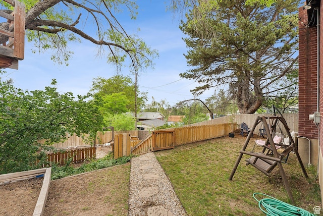 32 S Kingdon Ln E, North Salt Lake, UT 84054 - view of yard featuring a gate