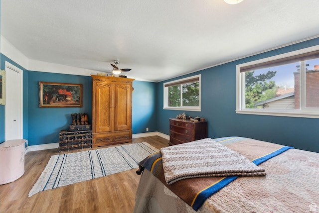 32 S Kingdon Ln E, North Salt Lake, UT 84054 - bedroom with wood finished floors and baseboards