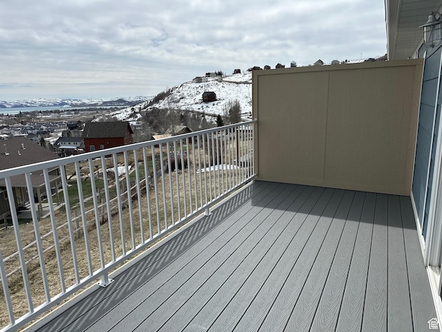 wooden deck featuring a mountain view
