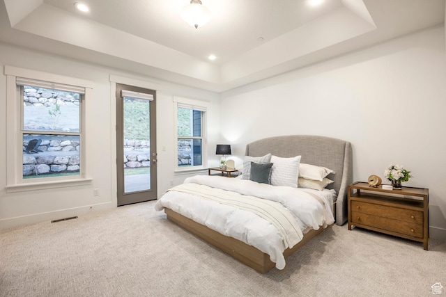 14943 S Auburn Sky Dr Unit 129, Draper, UT 84020 - carpeted bedroom with a raised ceiling, access to outside, and recessed lighting
