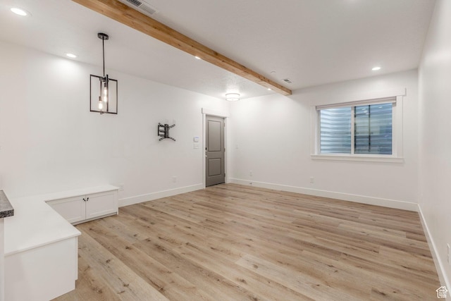 14943 S Auburn Sky Dr Unit 129, Draper, UT 84020 - unfurnished room with light wood-style floors, recessed lighting, and beamed ceiling