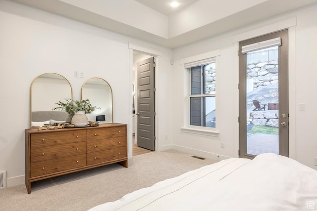 14943 S Auburn Sky Dr Unit 129, Draper, UT 84020 - bedroom with light colored carpet, access to exterior, and baseboards