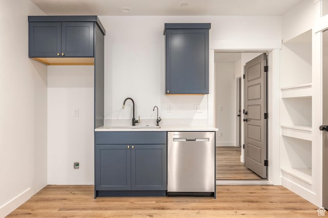14943 S Auburn Sky Dr Unit 129, Draper, UT 84020 - kitchen featuring dishwasher, a sink, light countertops, and light wood-style flooring