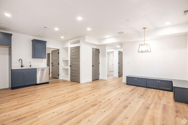 14943 S Auburn Sky Dr Unit 129, Draper, UT 84020 - kitchen featuring dishwasher, a sink, recessed lighting, light wood-style floors, and light countertops