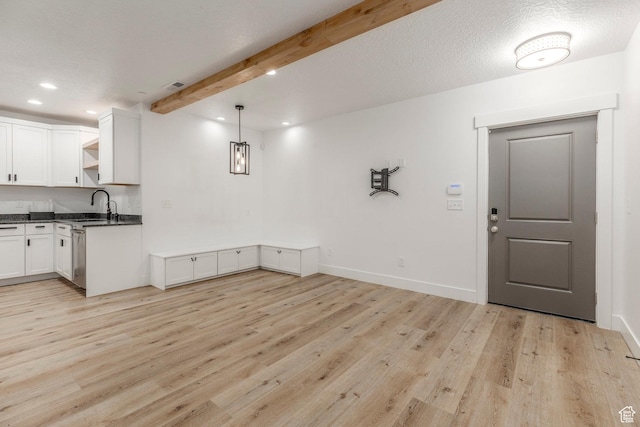 14943 S Auburn Sky Dr Unit 129, Draper, UT 84020 - kitchen featuring open shelves, light wood-type flooring, dark countertops, white cabinetry, and recessed lighting