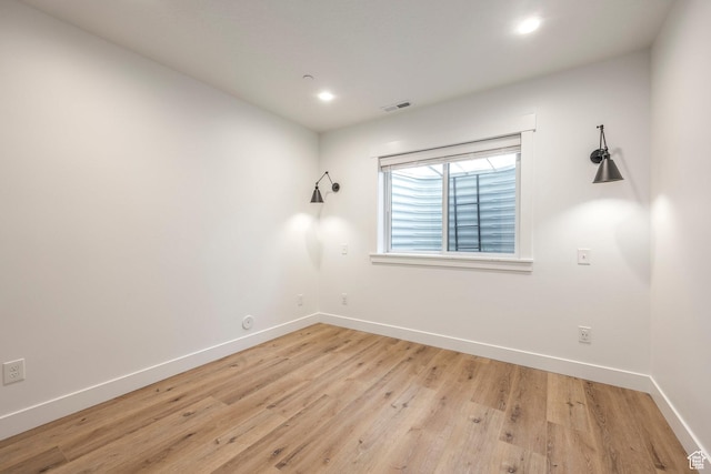14943 S Auburn Sky Dr Unit 129, Draper, UT 84020 - unfurnished room featuring baseboards, light wood-style flooring, and recessed lighting