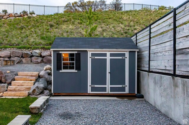 14943 S Auburn Sky Dr Unit 129, Draper, UT 84020 - view of shed with a fenced backyard