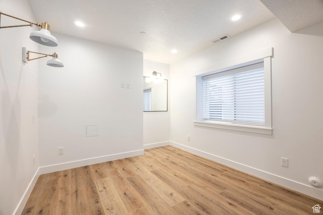 14943 S Auburn Sky Dr Unit 129, Draper, UT 84020 - empty room with light wood-type flooring and recessed lighting