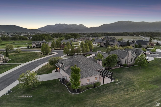 view of mountain background with nearby suburban area