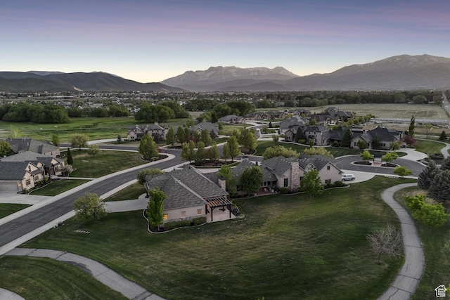 view of mountain backdrop with nearby suburban area