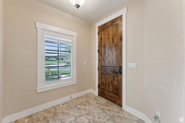 entrance foyer with baseboards