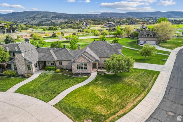 aerial view of residential area with a mountain backdrop